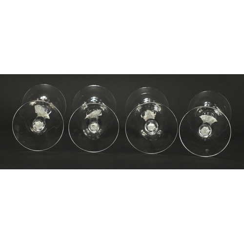 3972 - Set of four Faberge glasses with frosted glass figural stems, each 20.5cm high