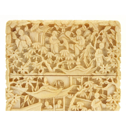 3034 - Exceptional Chinese Canton ivory card case, finely and deeply carved with figures crossing bridges a... 