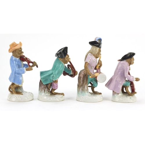 3049 - Eleven German porcelain monkey band figures in the style of Meissen, each with blue under glaze mark... 