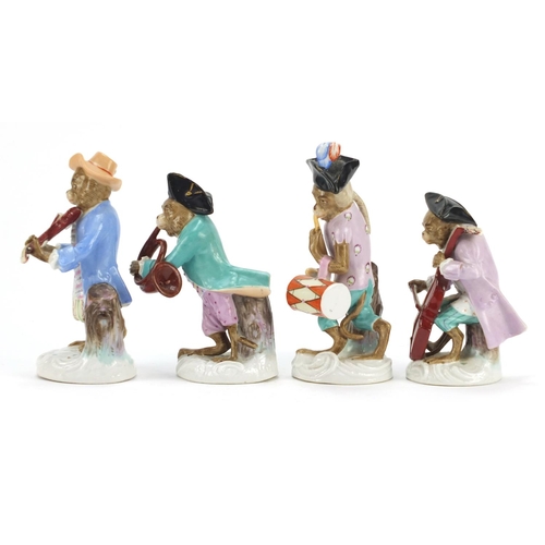 3049 - Eleven German porcelain monkey band figures in the style of Meissen, each with blue under glaze mark... 