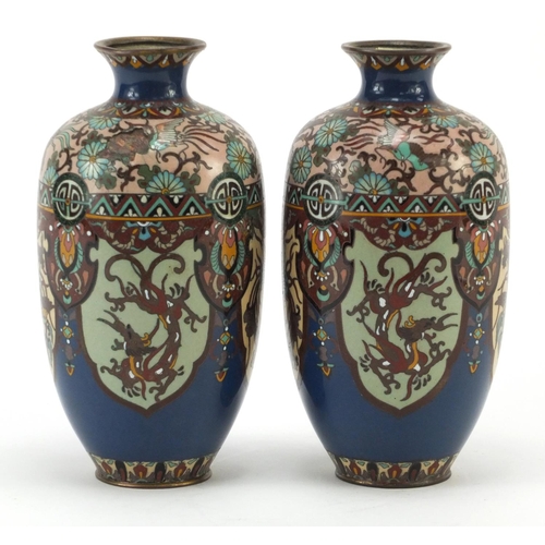 3387 - Pair of Japanese cloisonné vases enamelled with panels of birds of paradise and dragons, each 18.5cm... 