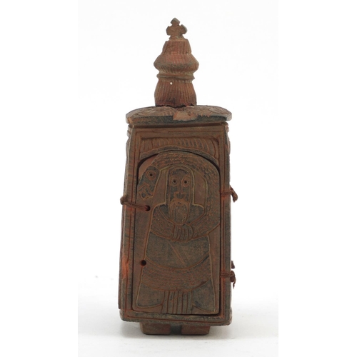 3828 - Russian Orthodox terracotta travelling shrine carved with figures and Orthodox crosses, 11.5cm high