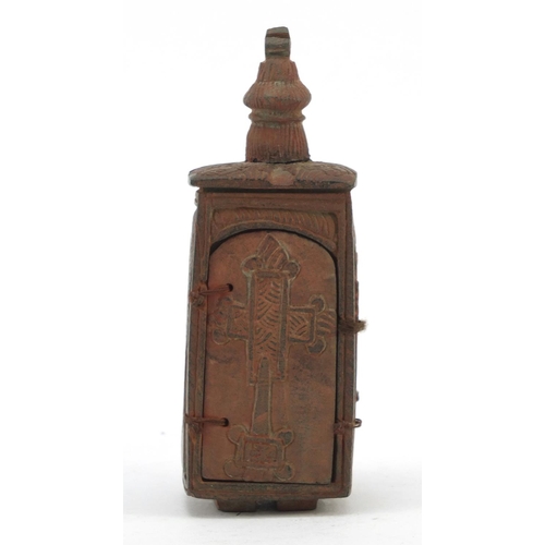 3828 - Russian Orthodox terracotta travelling shrine carved with figures and Orthodox crosses, 11.5cm high