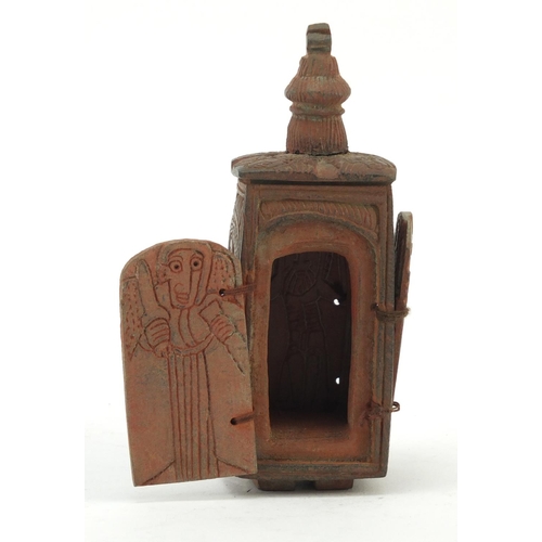 3828 - Russian Orthodox terracotta travelling shrine carved with figures and Orthodox crosses, 11.5cm high