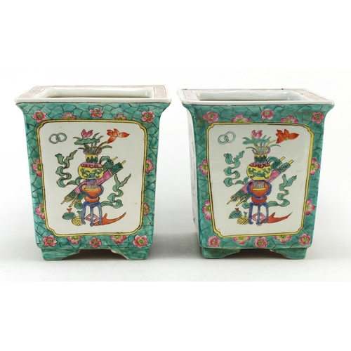 3555 - Pair of Chinese porcelain planters, each hand painted in the famille rose palette with panels of luc... 