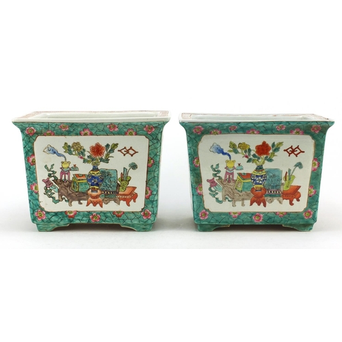 3555 - Pair of Chinese porcelain planters, each hand painted in the famille rose palette with panels of luc... 