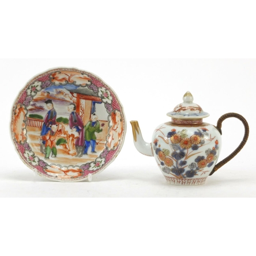 3208 - Chinese porcelain teapot and a saucer hand painted in the Mandarin palette with figures, the largest... 