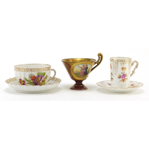 3912 - Two Dresden porcelain cabinet cups and saucers and a Vienna jewelled cup finely hand painted with a ... 