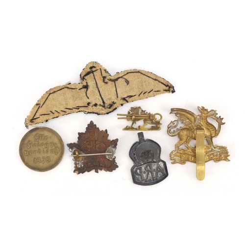 3416 - British and German militaria including RAF cloth patch, silver ARP lapel and the Buffs cap badge