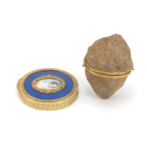 3679 - Circular gilt and enamel compact hand painted with a female and an agate cave trinket, the largest 8... 