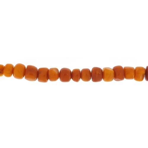 3141 - Butterscotch amber coloured bead necklace, 60cm in length, 65.0g