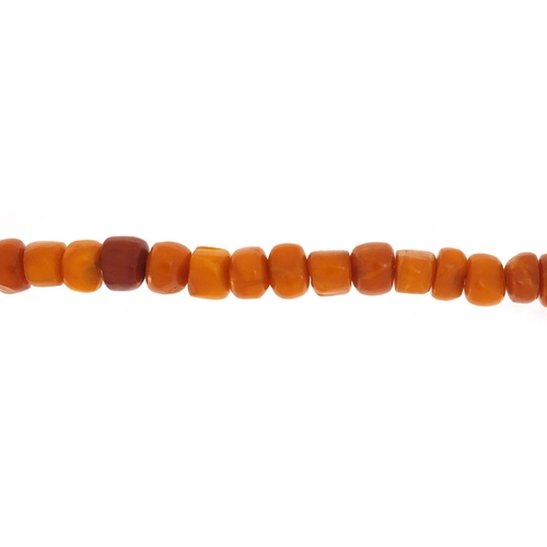 3141 - Butterscotch amber coloured bead necklace, 60cm in length, 65.0g