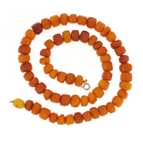 3141 - Butterscotch amber coloured bead necklace, 60cm in length, 65.0g