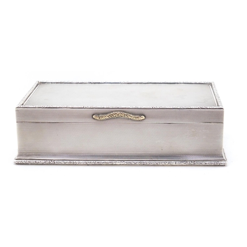 3229 - George V rectangular silver cigar box with hinged lid and engine turned decoration, by Adie Brothers... 