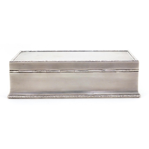 3229 - George V rectangular silver cigar box with hinged lid and engine turned decoration, by Adie Brothers... 