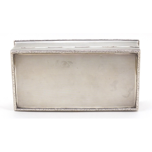 3229 - George V rectangular silver cigar box with hinged lid and engine turned decoration, by Adie Brothers... 