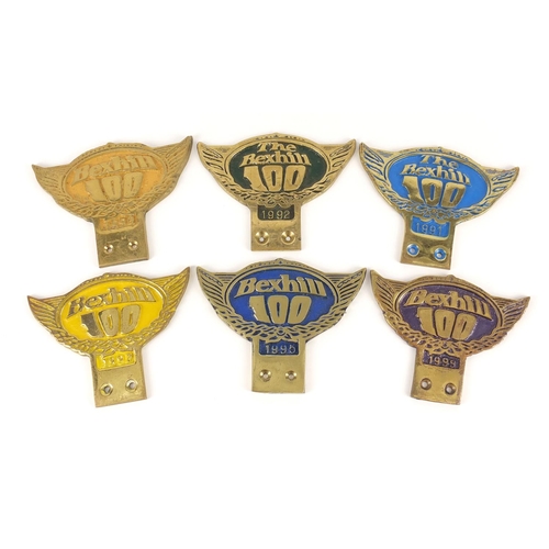 3240 - Six vintage Bexhill 100 car year badges, each 10cm high