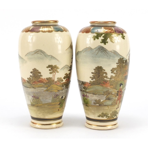 3215 - Pair of Japanese Satsuma pottery vases hand painted with figures in landscapes, character marks to t... 