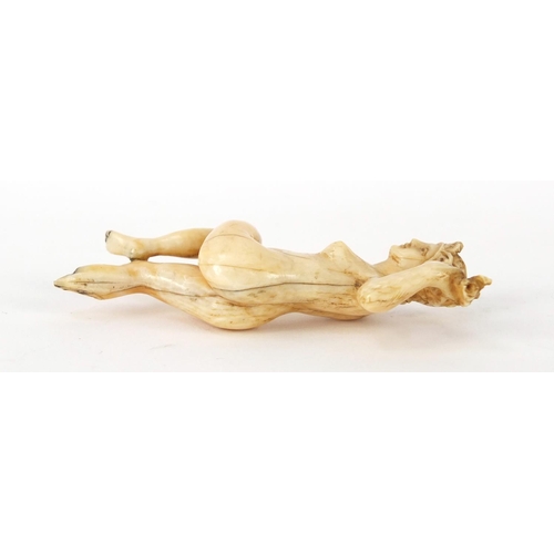 3993 - Antique ivory carving of a nude female holding a wreath, 8cm high