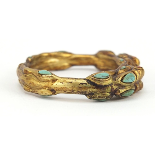 3836 - Tibetan gilt metal dragon bangle set with turquoise and coral, 8cm in diameter