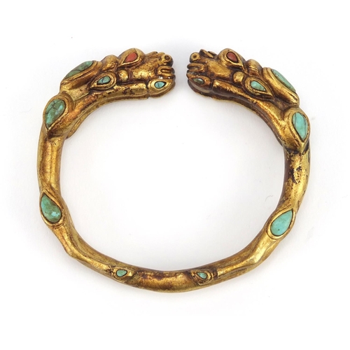 3836 - Tibetan gilt metal dragon bangle set with turquoise and coral, 8cm in diameter