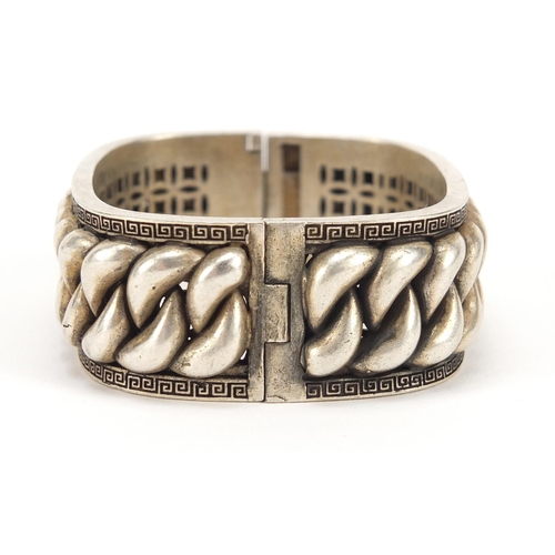 3393 - Chinese silver coloured metal rope twist design bangle, impressed character marks to the inside, 7.5... 