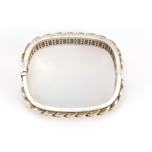 3393 - Chinese silver coloured metal rope twist design bangle, impressed character marks to the inside, 7.5... 