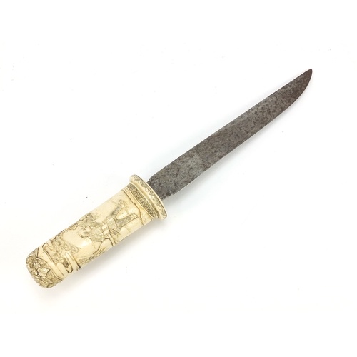 3206 - Japanese Tanto sword having a steel blade and bone handle carved with working figures, 31cm in lengt... 