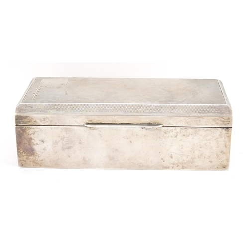 3096 - Elizabeth II rectangular silver cigar box, by Walker & Hall, the hinged lid with engine turned decor... 