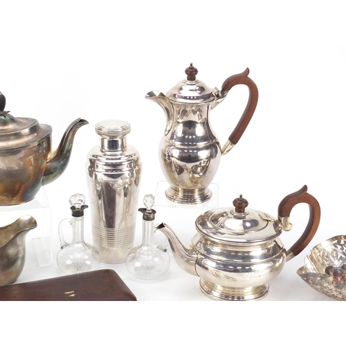 3360 - Silver and silver plate including a teapot and coffee pot retailed by Garrard & Co, cocktail shaker,... 