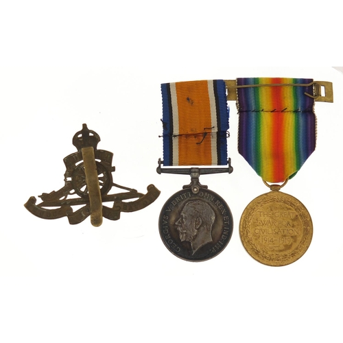 3522 - British military World War I pair and Royal Artillery cap badge, the pair awarded to L-30027DVR.J.C.... 