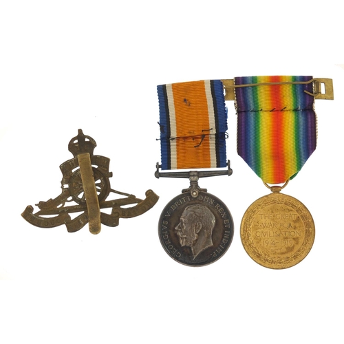 3522 - British military World War I pair and Royal Artillery cap badge, the pair awarded to L-30027DVR.J.C.... 