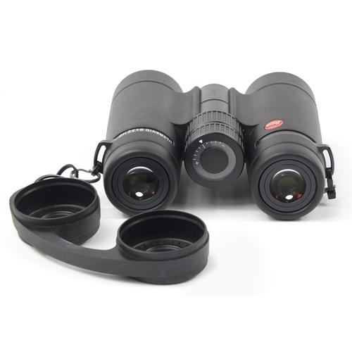 3891 - Pair of Leica Ultravide 8x32 binoculars with case, lens cleaner and paperwork