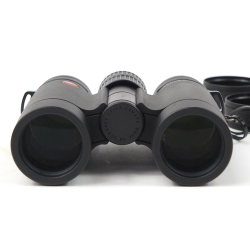 3891 - Pair of Leica Ultravide 8x32 binoculars with case, lens cleaner and paperwork