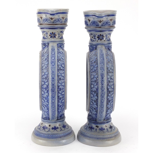 3372 - Pair of Bavarian salt glazed jugs, each numbered 566A to the bases, each 35.5cm high