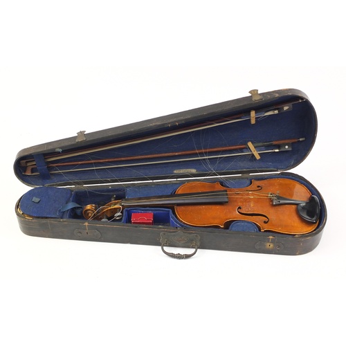 3464 - Old wooden violin with two bows having mother of pearl frogs and a George Withers & sons case, the v... 