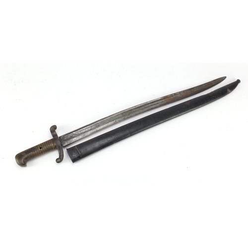 3115 - French Military interest Chassepot bayonet with scabbard, impressed marks to the blade, 72cm in leng... 