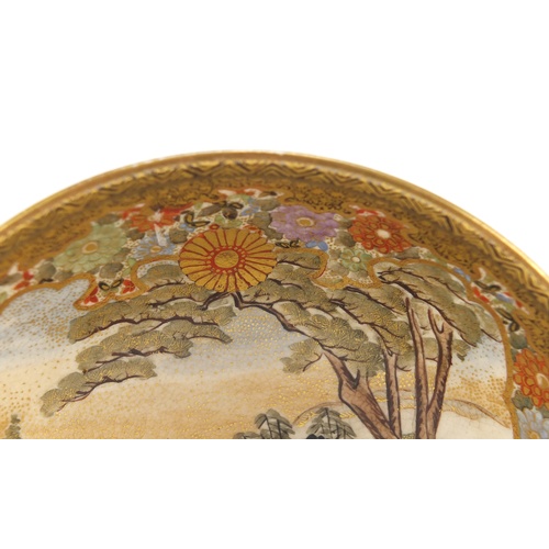 3214 - Japanese Satsuma pottery bowl, finely hand painted with figures in a landscape and flowers, four fig... 