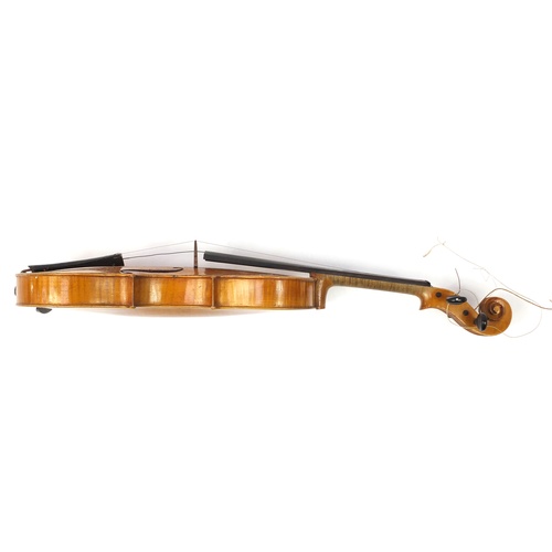 3462 - Old wooden violin with two bows having mother of pearl frogs and a fitted case, the violin back 14 i... 