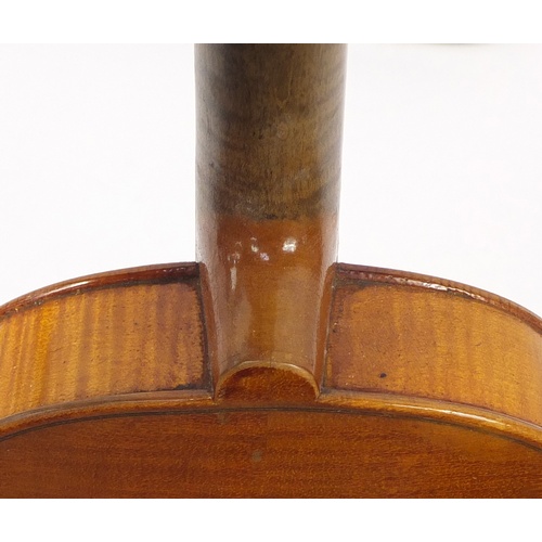 3462 - Old wooden violin with two bows having mother of pearl frogs and a fitted case, the violin back 14 i... 