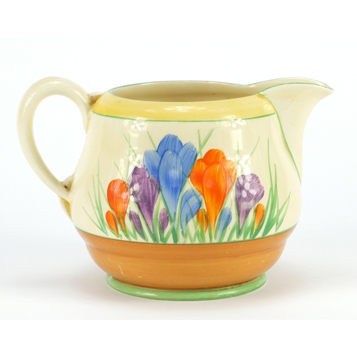 3584 - Art Deco Clarice Cliff pottery jug hand painted in the crocus pattern and a similar plate, the jug 1... 