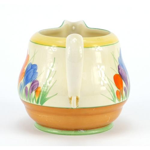 3584 - Art Deco Clarice Cliff pottery jug hand painted in the crocus pattern and a similar plate, the jug 1... 