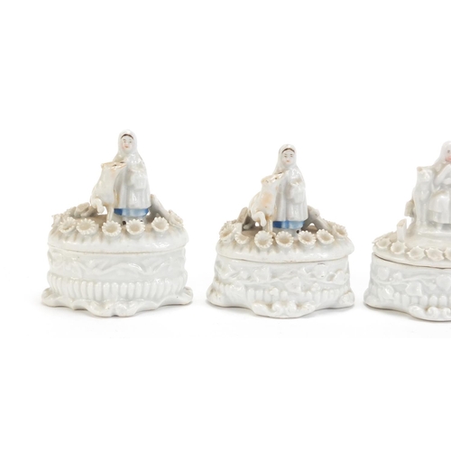 1252 - Three continental porcelain trinket boxes and four covers, the largest 9cm high