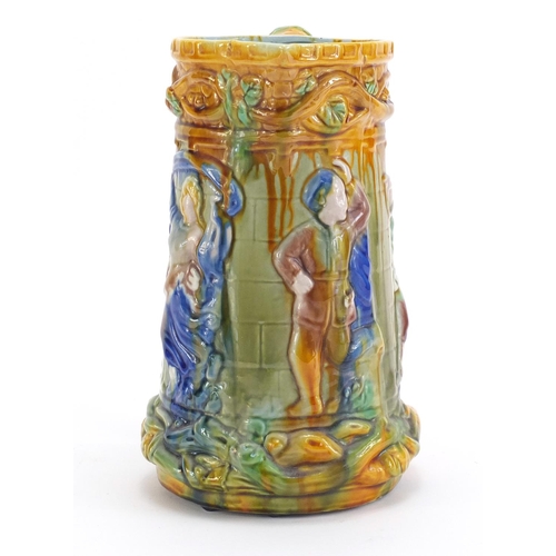 1180 - Victorian majolica jug decorated with figures, 25cm high