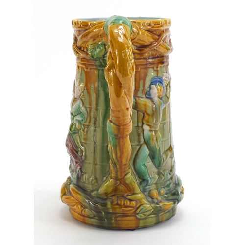 1180 - Victorian majolica jug decorated with figures, 25cm high