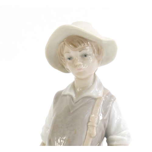 1178 - Lladro figure of a boy, 22cm high