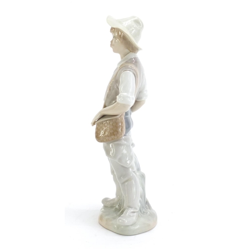 1178 - Lladro figure of a boy, 22cm high