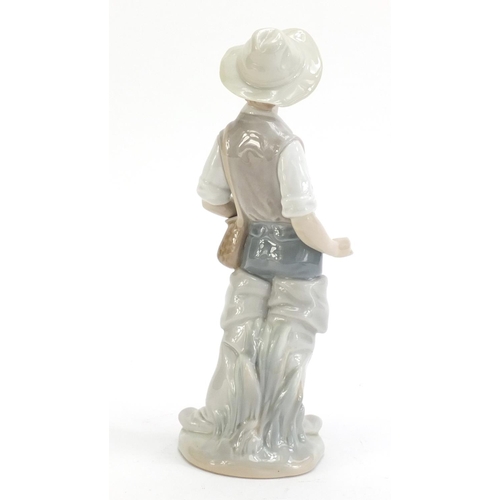 1178 - Lladro figure of a boy, 22cm high