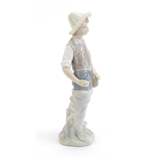 1178 - Lladro figure of a boy, 22cm high