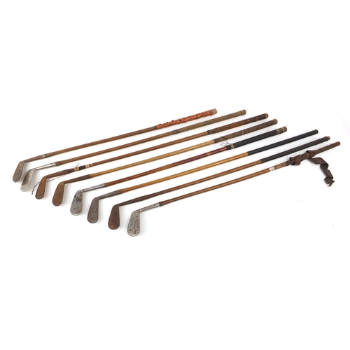 776 - Eight assorted wooden shafted golf clubs, the largest 100cm in length